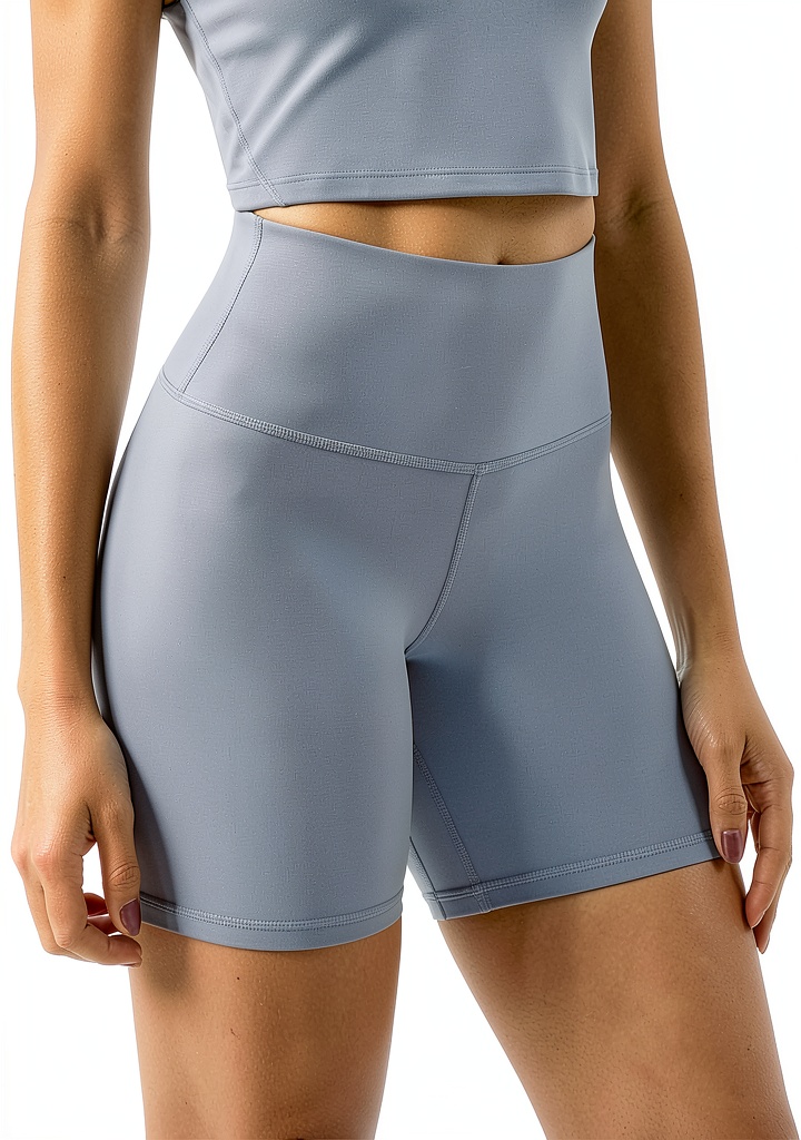 Woman wearing SportsS cycling compression shorts during a road ride